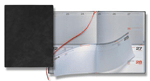 dual format daily weekly desk planner with black cover